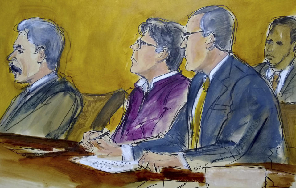 Keith Raniere (centre) shown sitting at defence table in an artist sketch from court on June 19. 