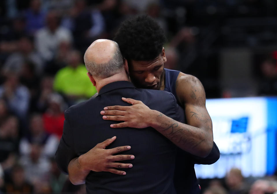 <p>Head coach Greg Herenda of the Fairleigh Dickinson Knights embraces Mike Holloway Jr. #34 after their 49-87 loss to the Gonzaga Bulldogs in the first round of the 2019 NCAA Men’s Basketball Tournament at Vivint Smart Home Arena on March 21, 2019 in Salt Lake City, Utah. (Tom Pennington/Getty Images) </p>