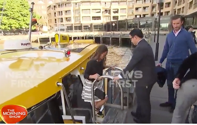 The newlyweds appeared to be going on a water taxi ride around the harbour. Photo: 7News