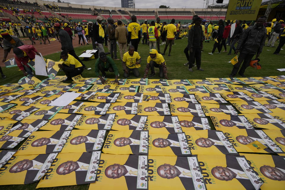 Supporters of Kenyan presidential candidate William Ruto wait for their candidate at his final electoral campaign rally at Nyayo stadium in Nairobi, Kenya Saturday, Aug. 6, 2022. Kenya is due to hold its general election on Tuesday, Aug. 9 as the East Africa's economic hub chooses a successor to President Uhuru Kenyatta. (AP Photo/Ben Curtis)