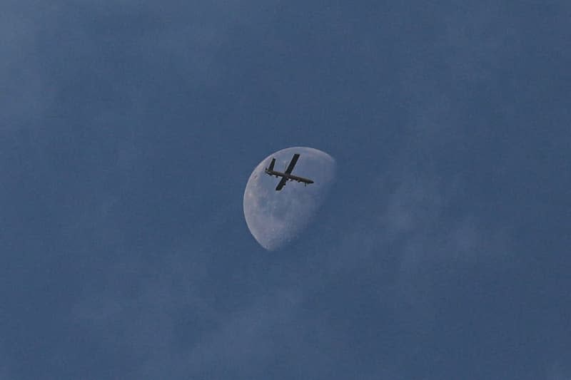 An Israeli Air Force unmanned reconnaissance aircraft (drone) flies over Dair El-Balah, central of Gaza Strip. Omar Ashtawy/APA Images via ZUMA Press Wire/dpa