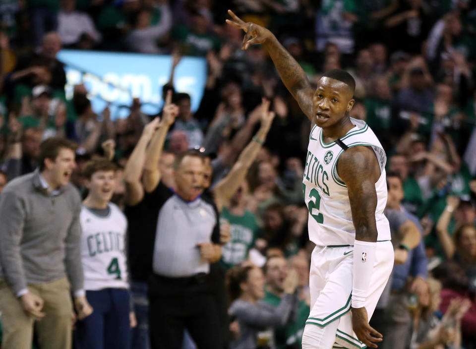 Terry Rozier celebrates one of his seven 3-pointers in the Celtics’ Game 1 rout of the visiting 76ers to open the Eastern Conference semifinals. (AP)