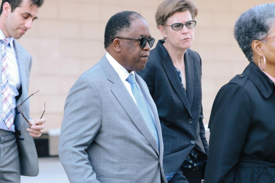 Former Los Angeles City Councilmember Mark Ridley-Thomas walks from the federal courthouse.