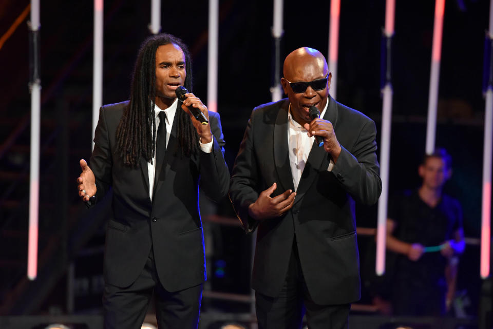 Fab Morvan and and the voice of Milli Vanilli John Davis performing together in 2018 