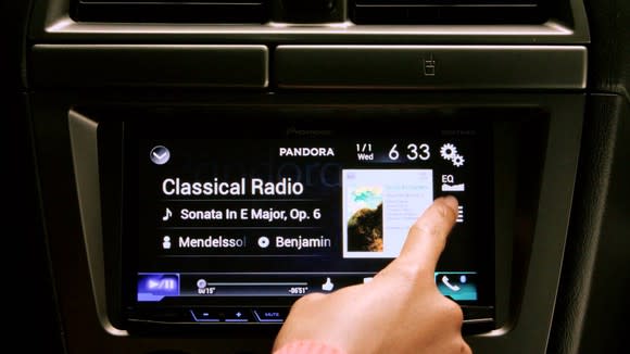 Pandora app running on a car dashboard.