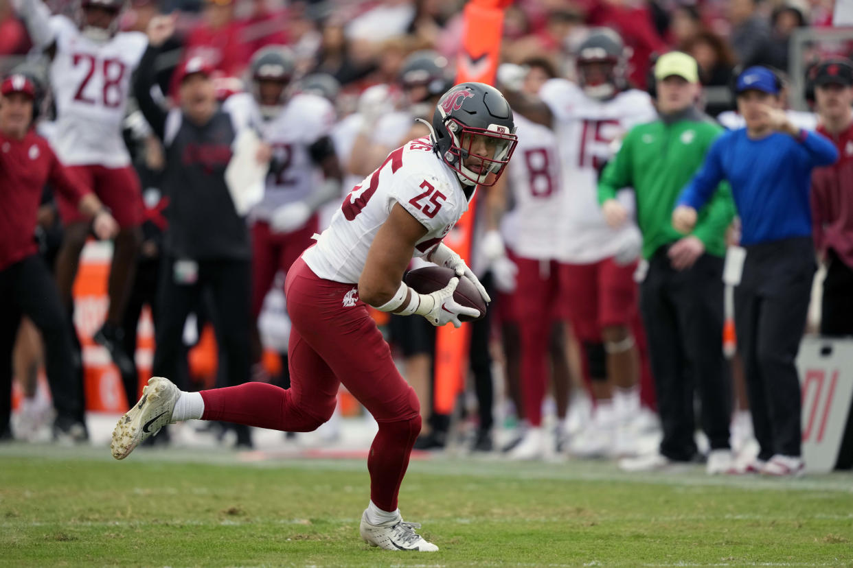 Nov 5, 2022; Stanford, California, USA; Washington State Cougars defensive back Jaden Hicks (25) returns a fumble for a touchdown against the Stanford Cardinal during the second quarter at Stanford Stadium. Mandatory Credit: Darren Yamashita-USA TODAY Sports