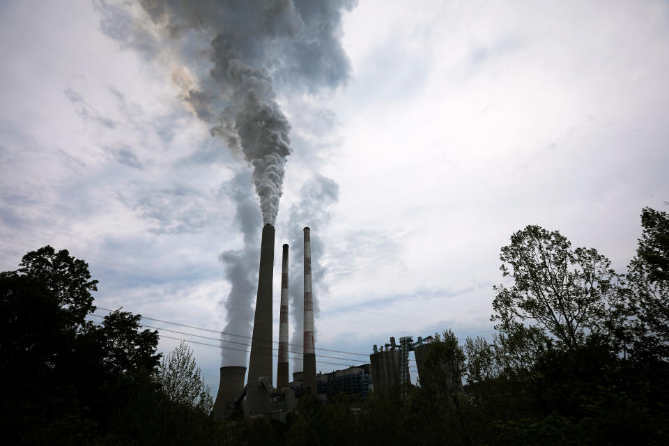 Exhaust rises from a power plant in Haywood, W.Va., in 2018.