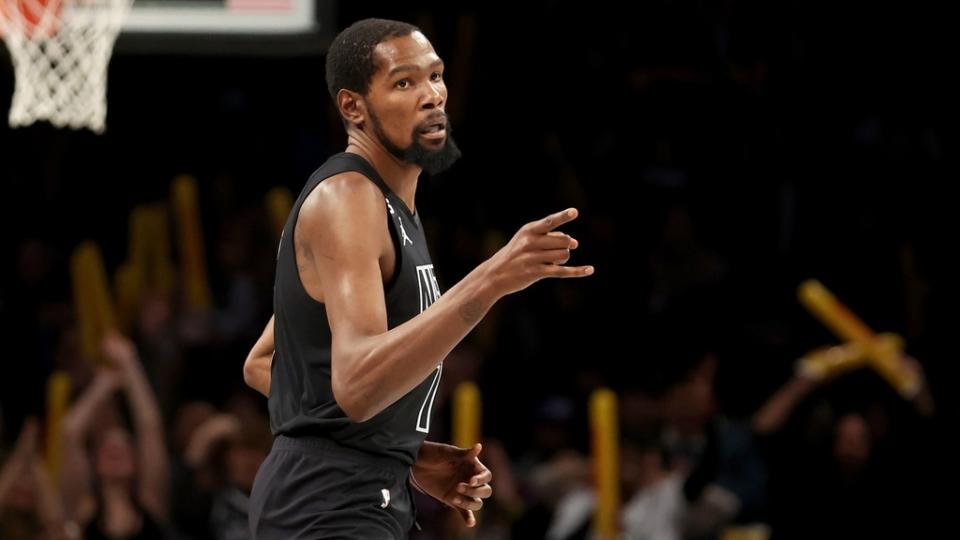 Caption: Dec 9, 2022; Brooklyn, New York, USA; Brooklyn Nets forward Kevin Durant (7) reacts after a basket against the Atlanta Hawks during the fourth quarter at Barclays Center.