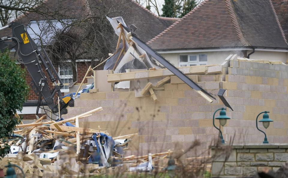 Work continues to demolish an unauthorised spa pool block at the home of Hannah Ingram-Moore, the daughter of the late Captain Sir Tom Moore, at Marston Moretaine, Bedfordshire. Picture date: Monday February 5, 2024.