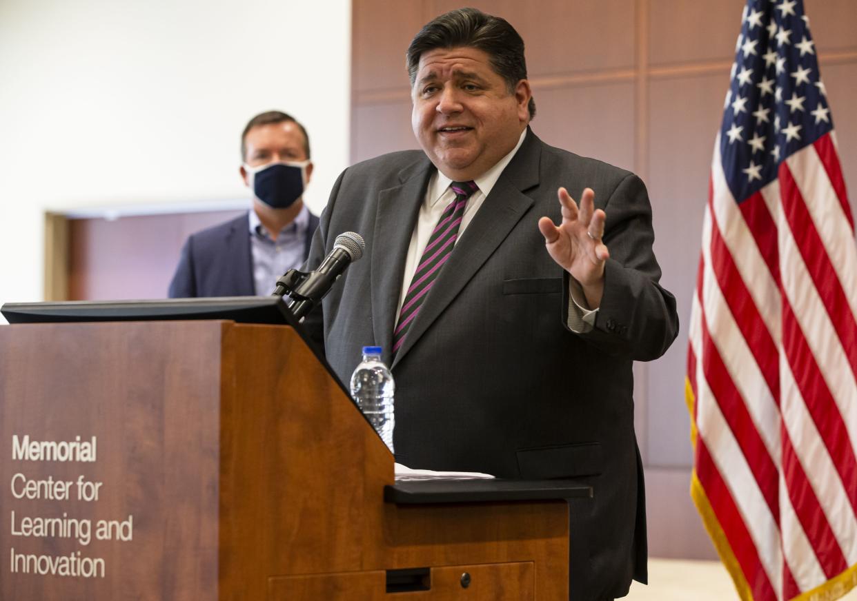 Illinois Governor JB Pritzker talks about the amount of testing going on for professional sports and players staying in a bubble compared to high school athletes when asked why high school football was being delayed during a press conference to speak about the state surpassing 5 million COVID-19 tests since the beginning of the pandemic at the Memorial Center for Learning and Innovation on Monday, Sept. 21, 2020, in Springfield, Ill.