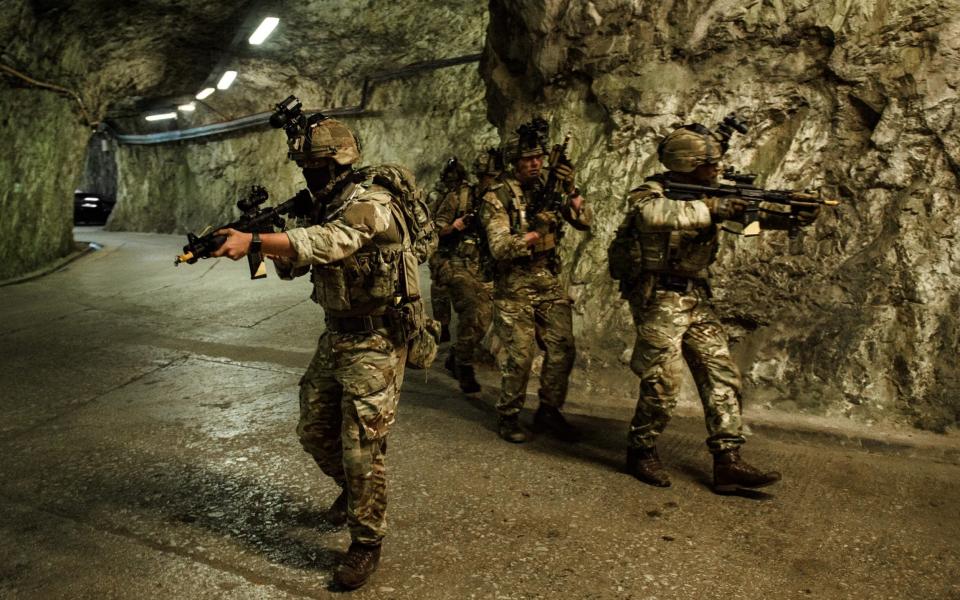 Royal Marines Commandos attack enemy positions inside the old military tunnels in the Rock of Gibraltar - Anthony Upton