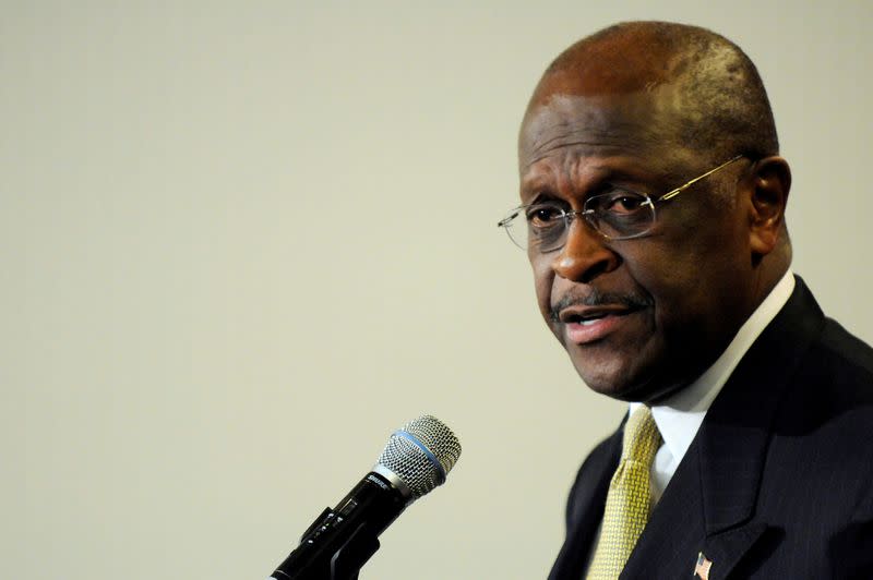 FILE PHOTO: Cain gives the Tea Party Express response to U.S. President Barack Obama's State of the Union Address, at the National Press Club in Washington