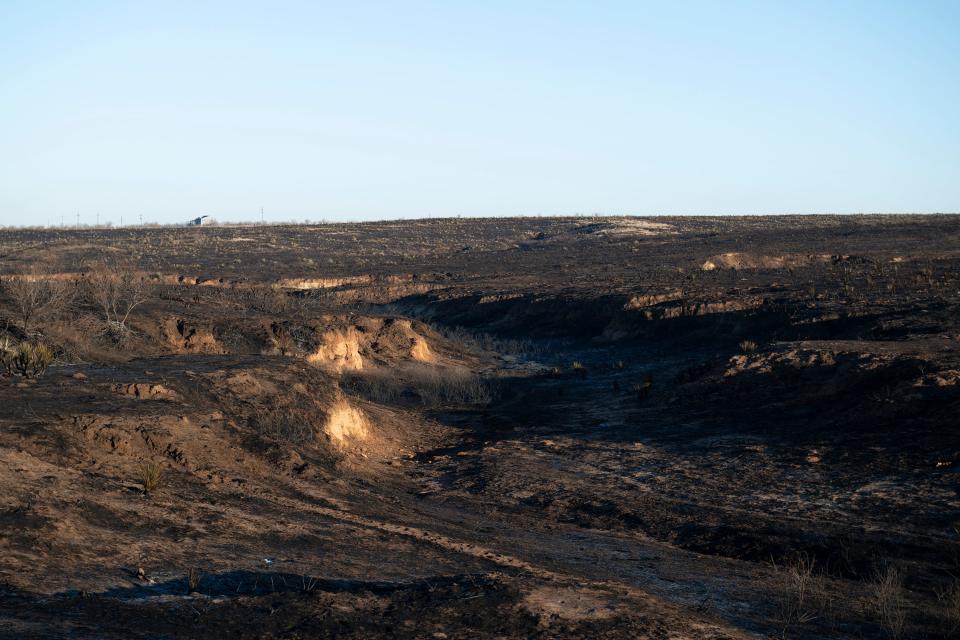 Remnants of the Windy Deuce Fire are seen between Fritch and Amarillo on Friday, March. 1.