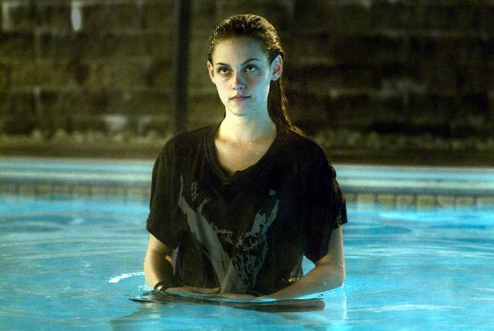 Kristen stewart in a pool fully clothed in adventureland