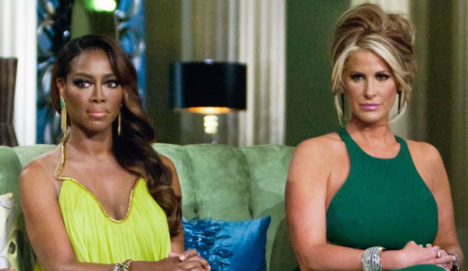 'RHOA' Brawl! Kim Zolciak Slams Kenya Moore And Her 'Fake Wedding' [Featured Image by Bravo]