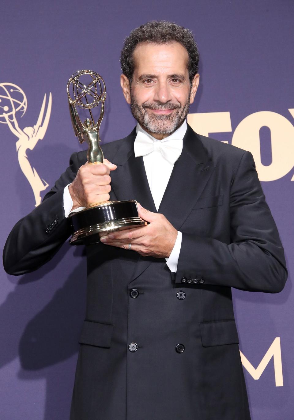 Tony Shaloub poses with his 2019 Emmy for outstanding supporting actor in a comedy series