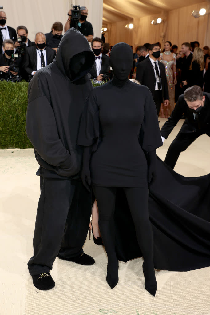 Kim Kardashian hit the red carpet with a mystery man that fans originally thought was estranged husband Kanye West. (Getty Images)