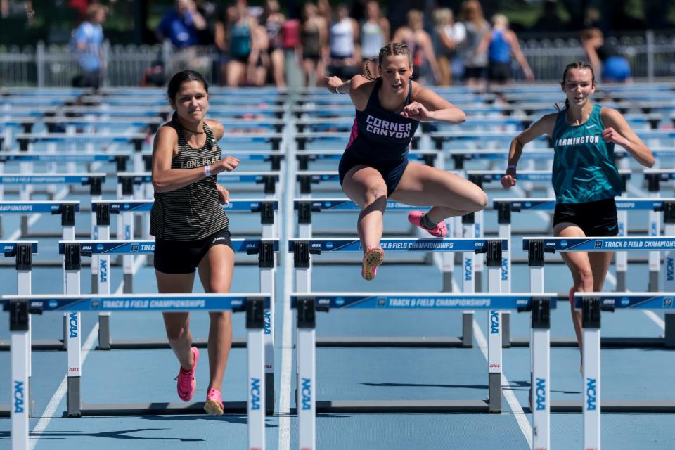 Athletes compete in a hurdles race at the Utah high school track and field championships at BYU in Provo on Thursday, May 18, 2023. | Spenser Heaps, Deseret News