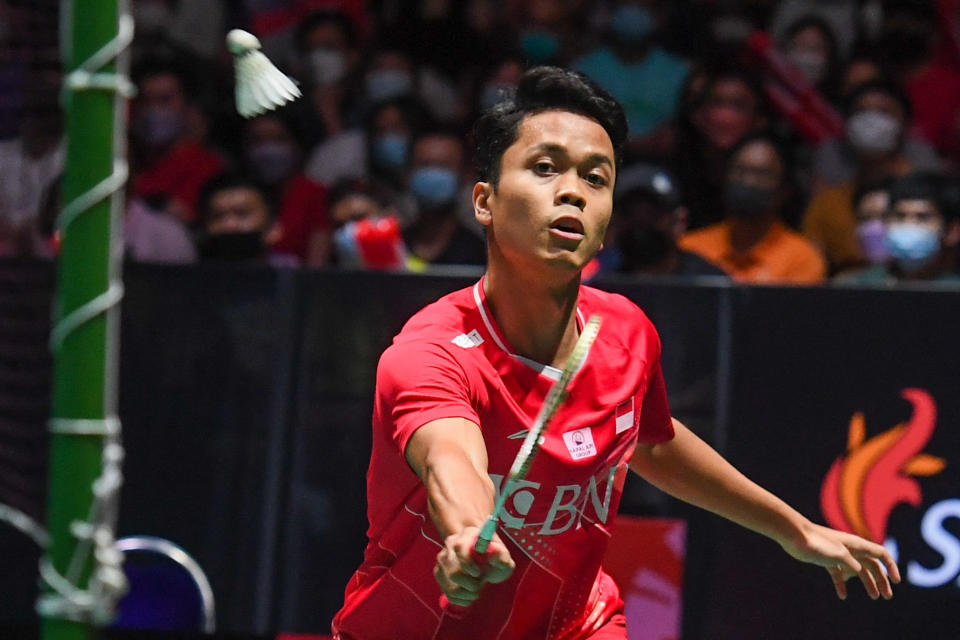 Indonesia's Anthony Sinisuka Ginting hits a return against Japan's Kodai Naraoka during the men's singles final at the Singapore Open badminton tournament in Singapore on July 17, 2022. (Photo by Roslan RAHMAN / AFP) (Photo by ROSLAN RAHMAN/AFP via Getty Images)