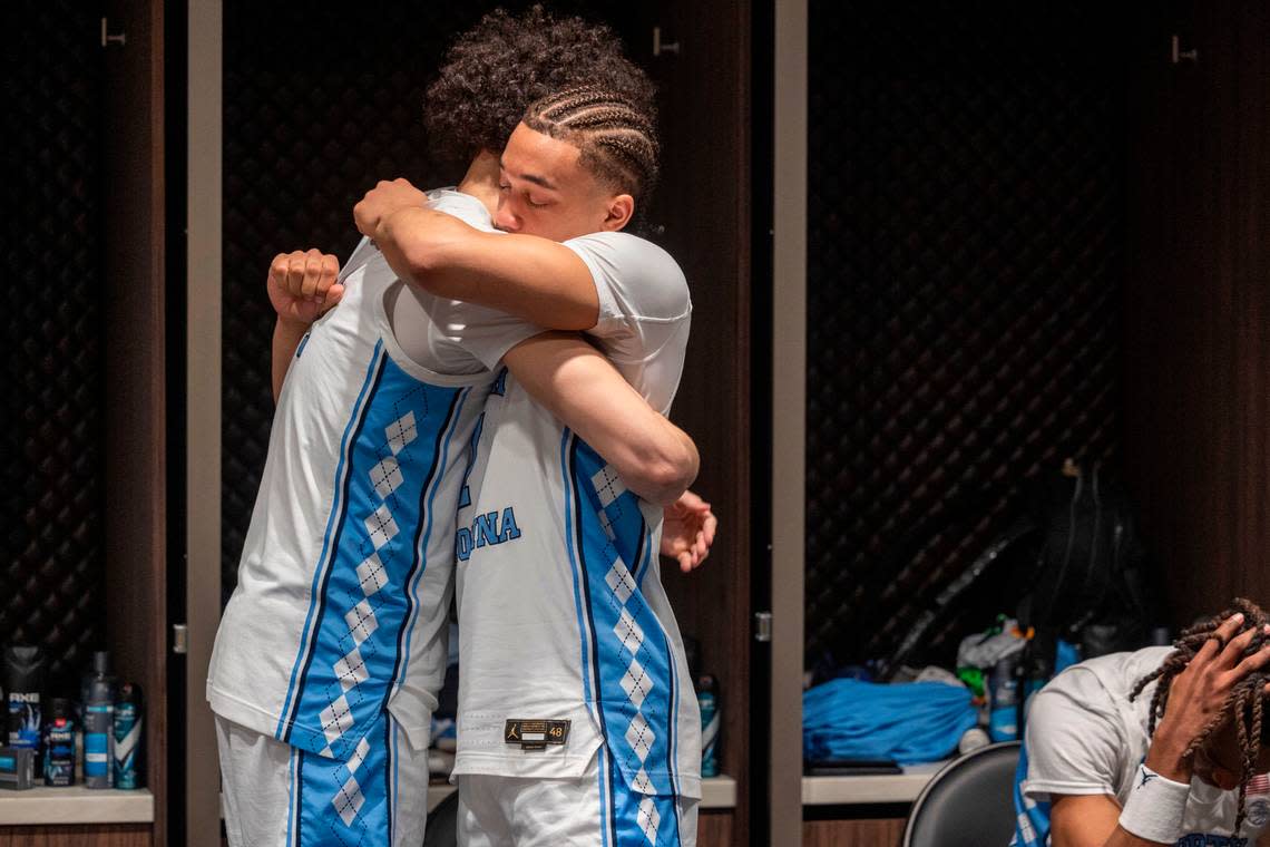 North Carolina’s Seth Trimble (7) embraces teammate Zayden High (1) inside the Tar Heels’ locker room following their 89-87 loss to Alabama in the West Regional Sweet Sixteen on Thursday, March 28, 2024 at Crypto.com Arena in Los Angeles, CA.