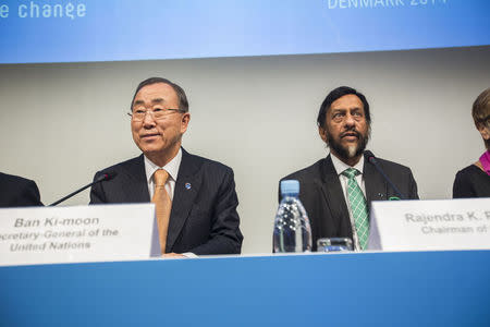 U.N. Secretary-General Ban Ki-moon (L) and Intergovernmental Panel on Climate Change (IPCC) Chairman Rajendra Pachauri present the AR5 Synthesis Report during a news conference in Copenhagen November 2, 2014. REUTERS/Niels Ahlmann Olesen/Scanpix Denmark