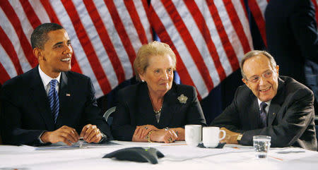 FILE PHOTO - Democratic US presidential candidate Senator Barack Obama (D-IL) meets with his foreign policy panel of former U.S. officials including former U.S. Secretary of State Madeleine Albright (2nd R) and former U.S. Secretary of Defense William Perry (R) at a hotel in Washington June 18, 2008. REUTERS/Jim Bourg/File Photo