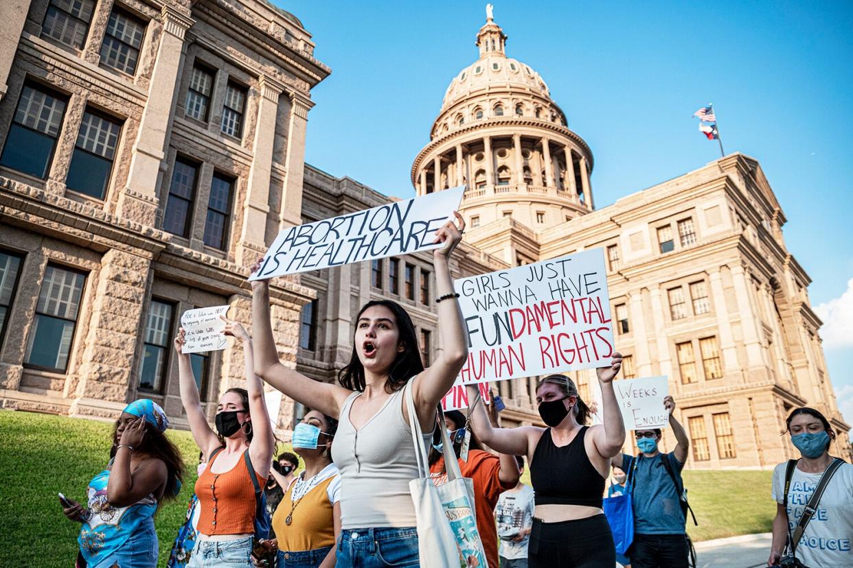 AUSTIN, TX - SEPT 1: Pro-choice protesters march outside the Texas State Capitol on Wednesday, Sept. 1, 2021 in Austin, TX. Texas passed SB8 which effectively bans nearly all abortions and it went into effect Sept. 1. A request to the Supreme Court to block the bill went unanswered and the Court still has yet to take any action on it.