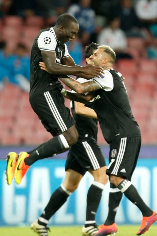 Besiktas' Vincent Aboubakar (L) celebrates with teammate Ricardo Quaresma after scoring a goal during their UEFA Champions League Geoup B match against Napoli, in Naples, on October 19, 2016