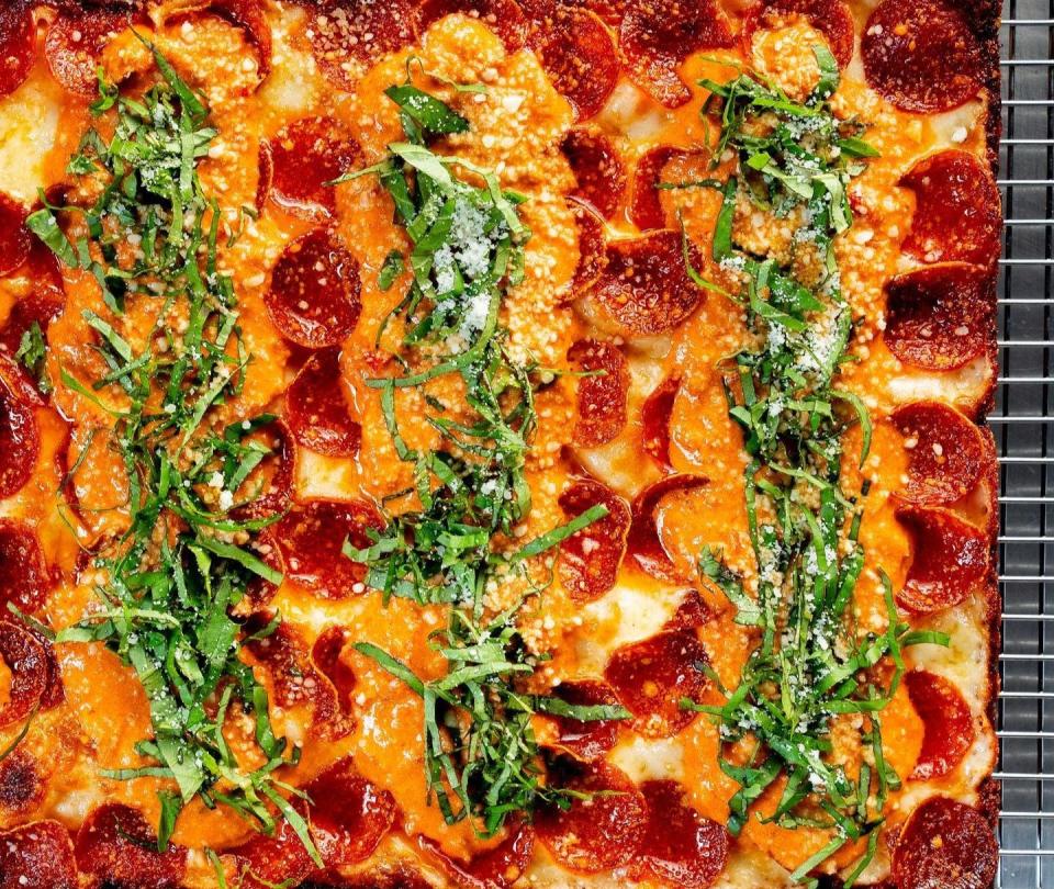 Death by Pizza's popular Vodka Roni pie is topped with mozzarella, pepperoni, vodka sauce and basil.