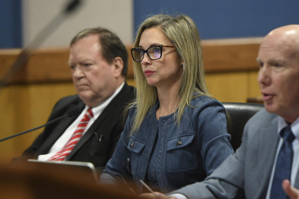 Attorney Jennifer L. Little representing former President Donald Trump listens to the judge during a hearing on charges against Trump in the Georgia election interference case on Thursday, March 28, 2024 in Atlanta. Lawyers for Trump argued in a court filing that the charges against him in the Georgia election interference case seek to criminalize political speech and advocacy conduct that is protected by the First Amendment. (Dennis Byron/Hip Hop Enquirer via AP)