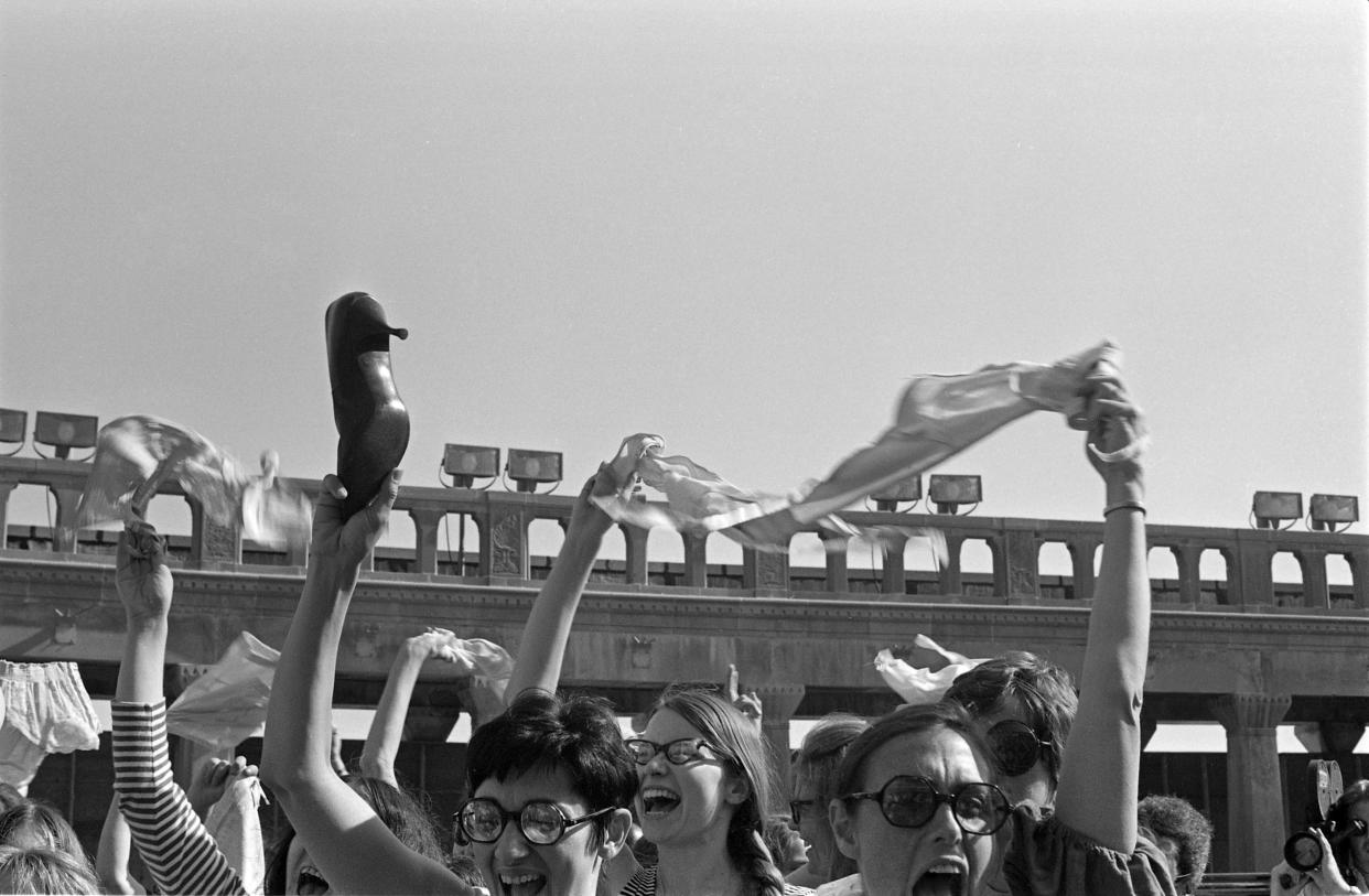 Feminist protestors, organized by the New York Radical Women, waved bras and high heels on the Atlantic City boardwalk outside of the Miss America pageant in 1968. (Photo: Bev Grant/Getty Images)