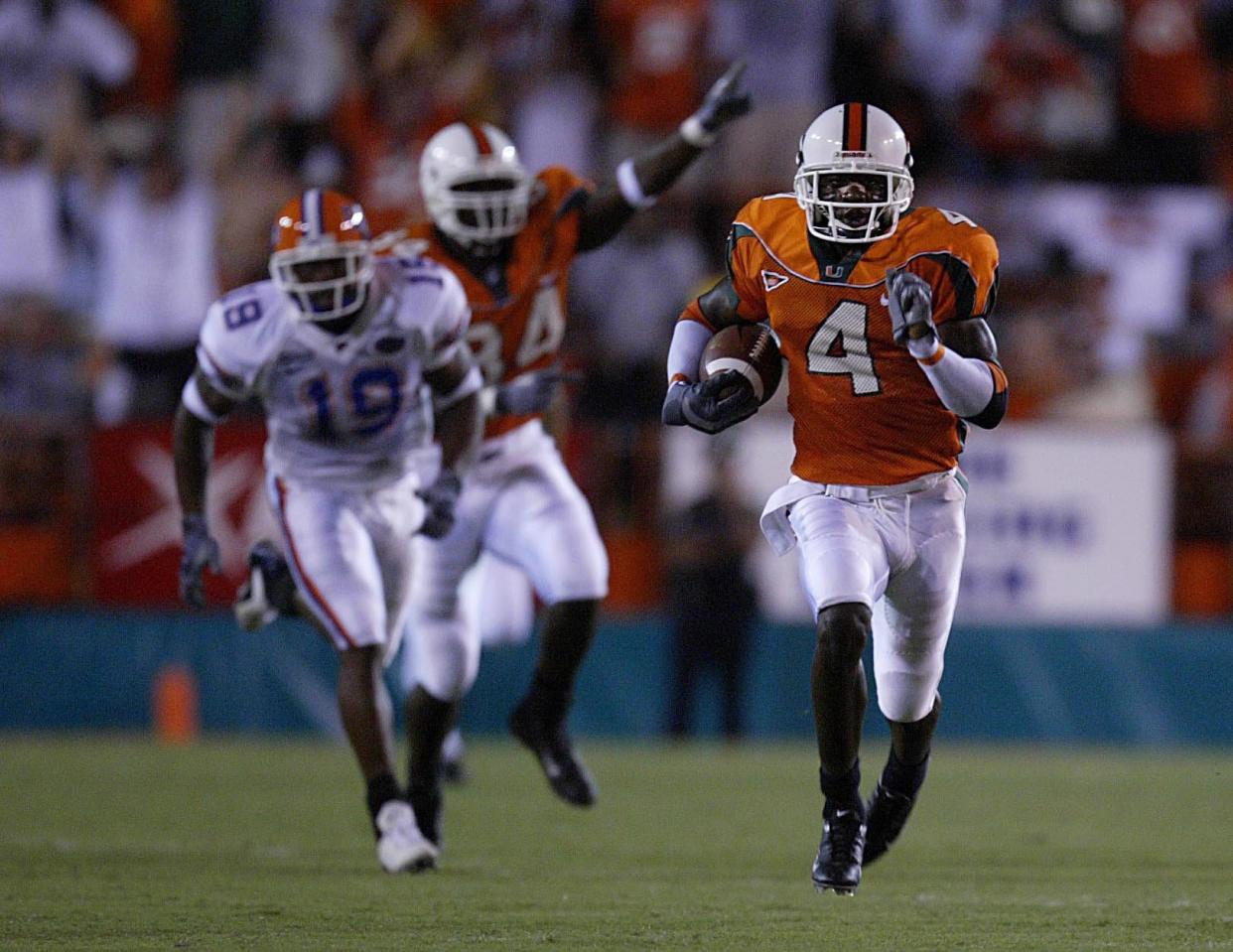 Miami Hurricanes returner Devin Hester races the length of the field for touchdown on the opening kickoff of the game against Florida in 2003.
