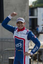 Chip Ganassi Racing driver Alex Palou (10) celebrates as he is announced as the winner on Victory Lane after the Honda Indy Grand Prix of Alabama auto race at Barber Motorsports Parkway, Sunday, April 18, 2021, in Birmingham, Ala. (AP Photo/Vasha Hunt)