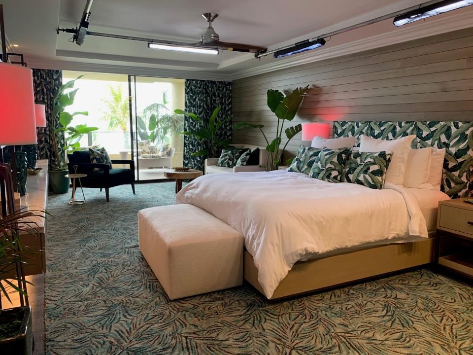 Fox used vintage fabric for the curtains, pillow covers, and headboard in the Palm Suite. Most of the fabric on the show comes from a Hawaiian company called Trendtex.