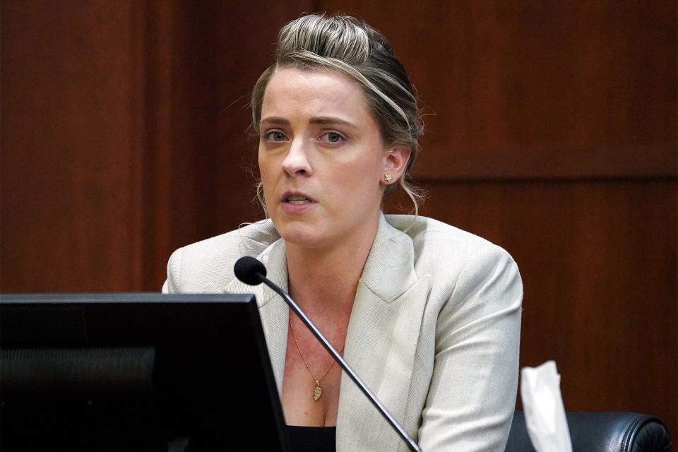 Whitney Henriquez, sister of Actor Amber Heard, testifies on the stand during Johnny Depp's defamation trial against ex-wife Amber Heard at the Fairfax County Circuit Courthouse in Fairfax, on May 18, 2022. - US actor Johnny Depp is suing ex-wife Amber Heard for libel after she wrote an op-ed piece in The Washington Post in 2018 referring to herself as a public figure representing domestic abuse.