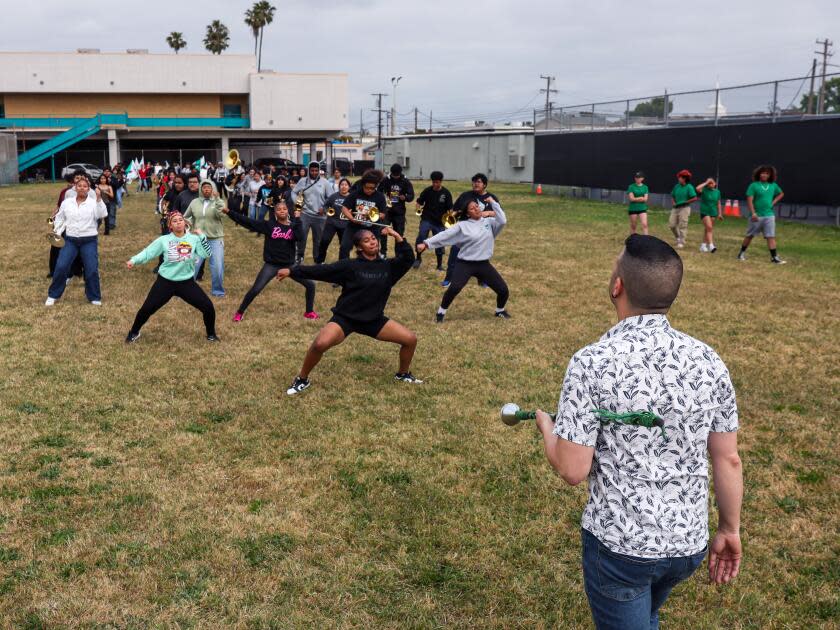 The Inglewood High School band rehearses for an upcoming performance.