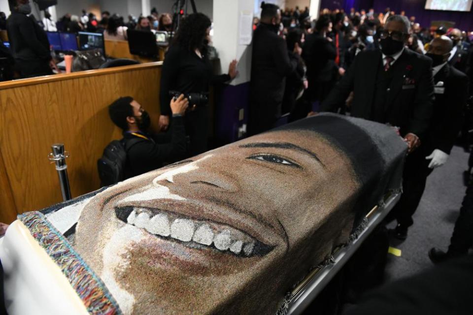 Daunte Wright’s casket is escorted out following a funeral in Minneapolis on Thursday.