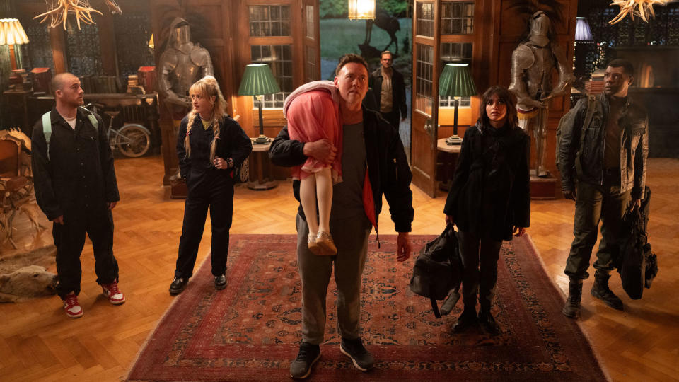 From left: Angus Cloud, Kathryn Newton, Alisha Weir (back to camera), Kevin Durand, Dan Stevens (background), Melissa Barrera and Will Catlett in “Abigail.”