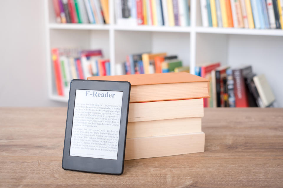 E-book reader on a stack of books