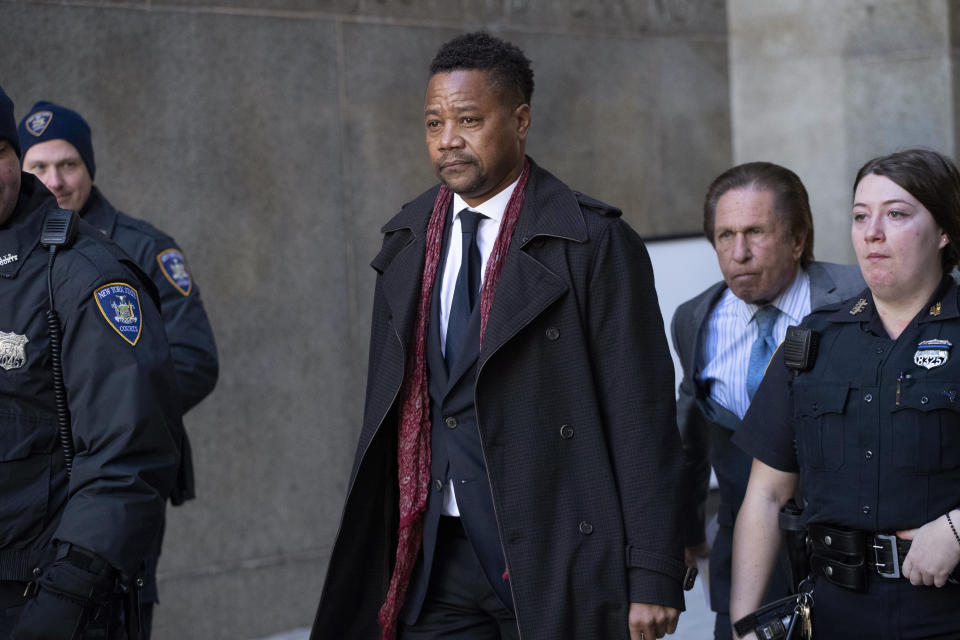 Cuba Gooding Jr. leaves court, Wednesday, Jan. 22, 2020, in New York. A New York City judge ruled that two additional women accusing Gooding of sexual misconduct will be allowed to testify at the "Jerry Maguire" actor's trial on charges he groped women at Manhattan bars in October 2018 and June 2019. (AP Photo/Mark Lennihan)