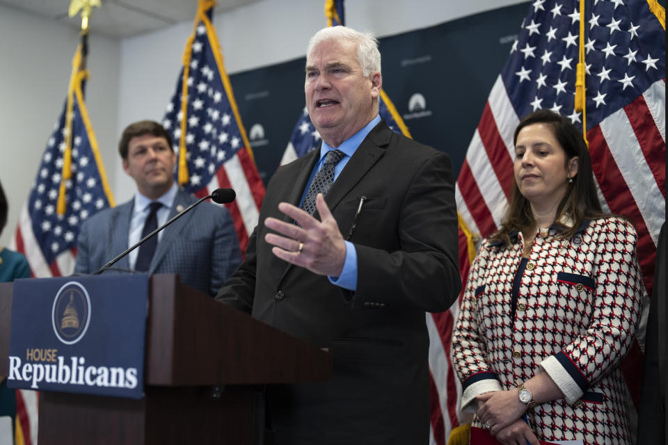 House Majority Whip Tom Emmer, R-Minn., center, flanked by House Budget Committee Chairman Jodey Arrington, R-Texas, left, and House Republican Conference Chair Elise Stefanik, R-N.Y., speaks to reporters following a closed-door meeting with fellow Republicans as Speaker of the House Kevin McCarthy, R-Calif., struggles to round up the votes for his sweeping debt ceiling package, at the Capitol in Washington, Wednesday, April 26, 2023. (AP Photo/J. Scott Applewhite)