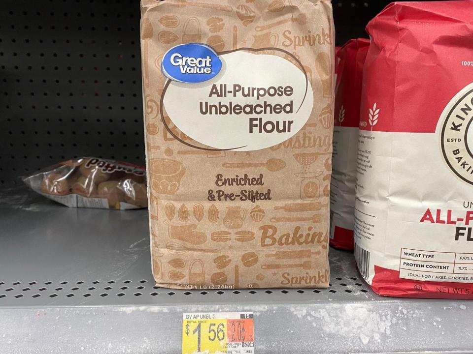 bags of flour on the shelves at walmart