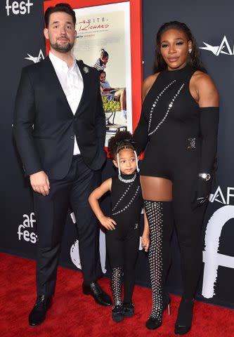 <p>LISA O'CONNOR/AFP/Getty</p> Alexis Ohanian (left), Serena Williams and daughter Alexis Olympia Ohanian Jr. photographed in Hollywood on Nov. 14, 2021