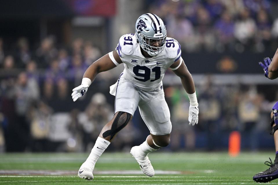 Dec 3, 2022; Arlington, TX, USA; Kansas State Wildcats defensive end Felix Anudike-Uzomah (91) in action during the game between the TCU Horned Frogs and the Kansas State Wildcats at AT&T Stadium. Mandatory Credit: Jerome Miron-USA TODAY Sports