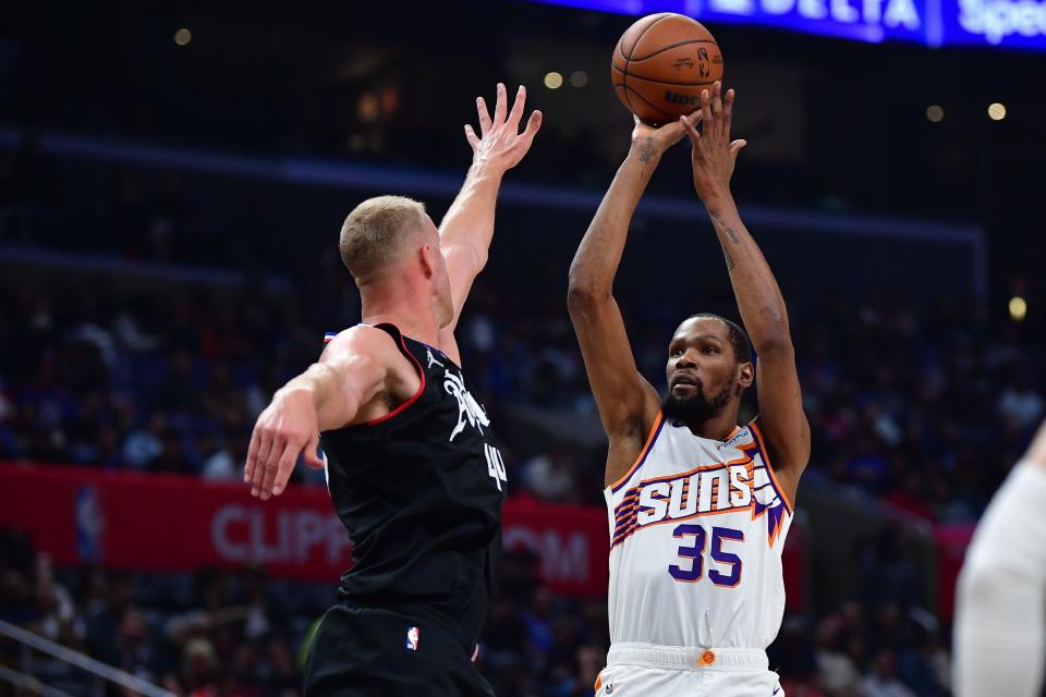 Phoenix Suns forward Kevin Durant (35) shoots against Los Angeles Clippers center Mason Plumlee (44) during the second half at Crypto.com Arena in Los Angeles on April 10, 2024.