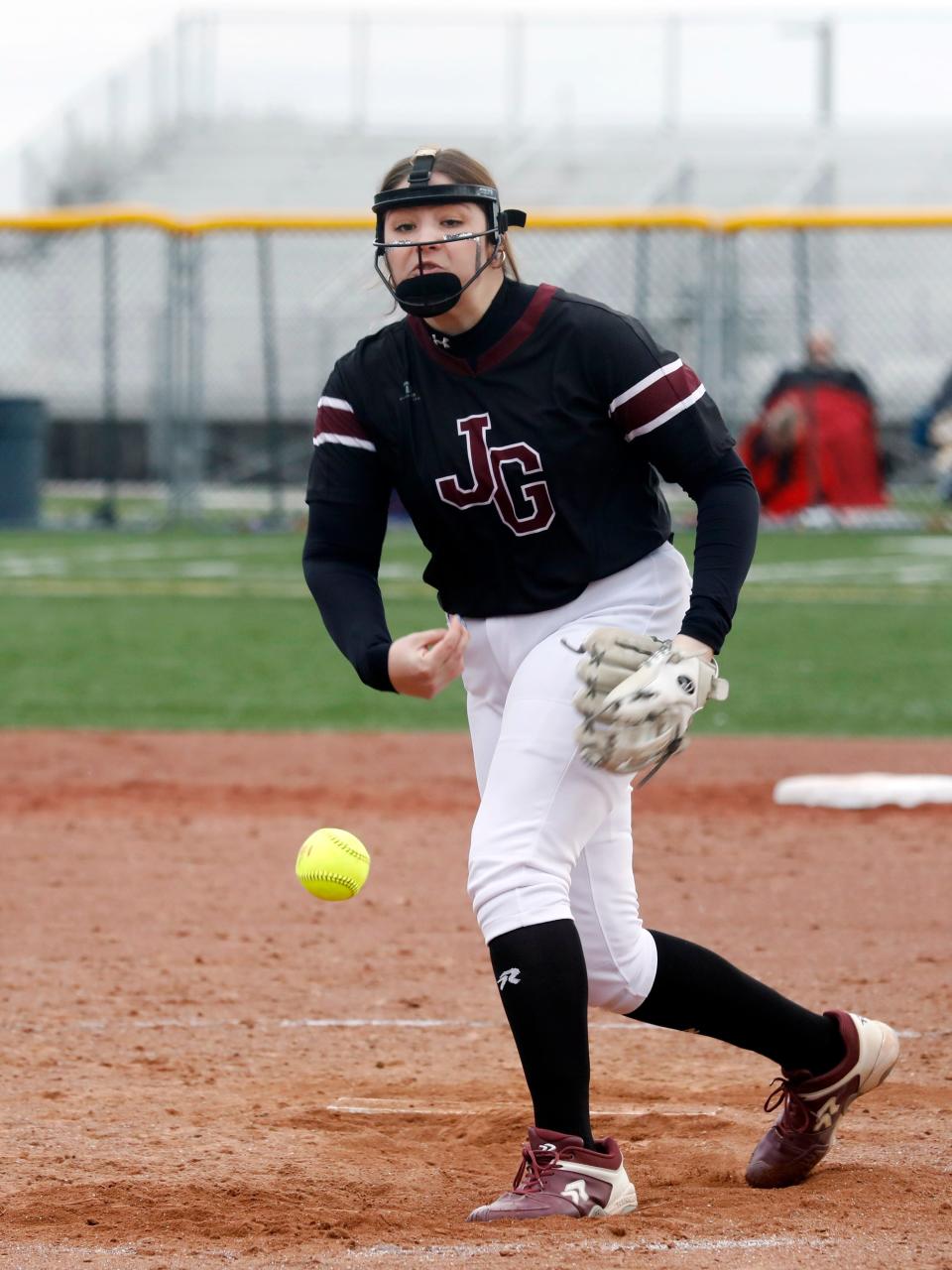 John Glenn junior pitcher Sydney Marshall fires a ball to the plate during a 10-0 win in five innings against visiting Morgan on Thursday in New Concord. Marshall fired a one-hitter with 10 strikeouts in her return from a back injury.