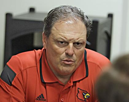 Louisville defensive coordinator Todd Grantham discusses the first week of practice for the Cardinals. Saturday, Aug. 9, 2014. (AP Photo/Garry Jones)