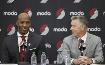 Neil Olshey, right, and Chauncey Billups talk to media after Billups was announced as the head coach of the Portland Trail Blazers at the team's practice facility in Tualatin, Ore., Tuesday, June 29, 2021. (AP Photo/Craig Mitchelldyer)