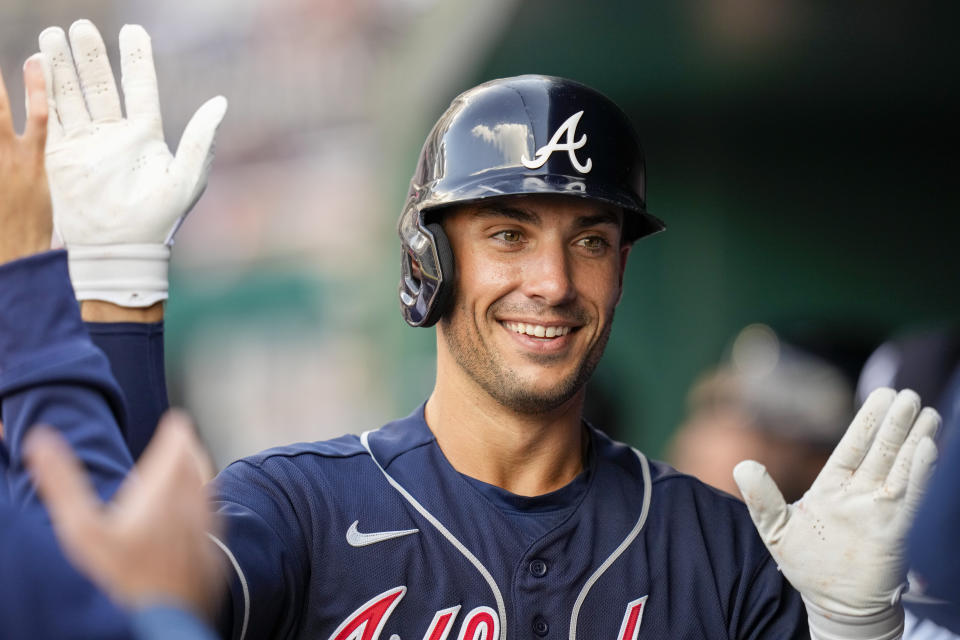 Atlanta Braves' Matt Olson celebrates after his solo home run during the first inning of a baseball game against the Washington Nationals at Nationals Park, Saturday, April 1, 2023, in Washington. (AP Photo/Alex Brandon)