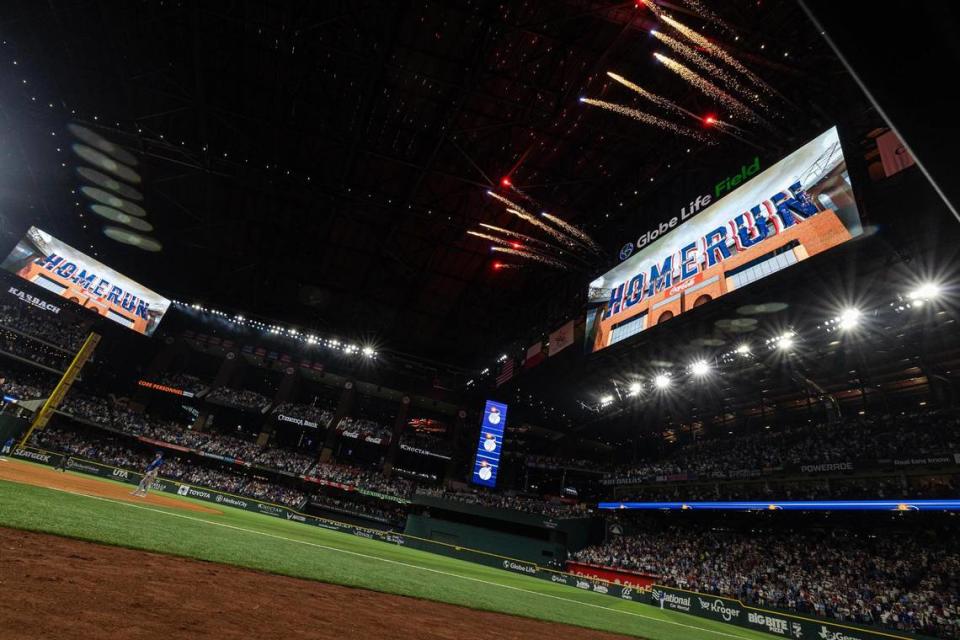 Fireworks go off after Rangers outfielder Adolis Garcia (53) hits the Rangers first home run of the season in the sixth inning of the season opener against the Chicago Cubs at Globe Life Field in Arlington on Thursday, March 28, 2024. Chris Torres/ctorres@star-telegram.com